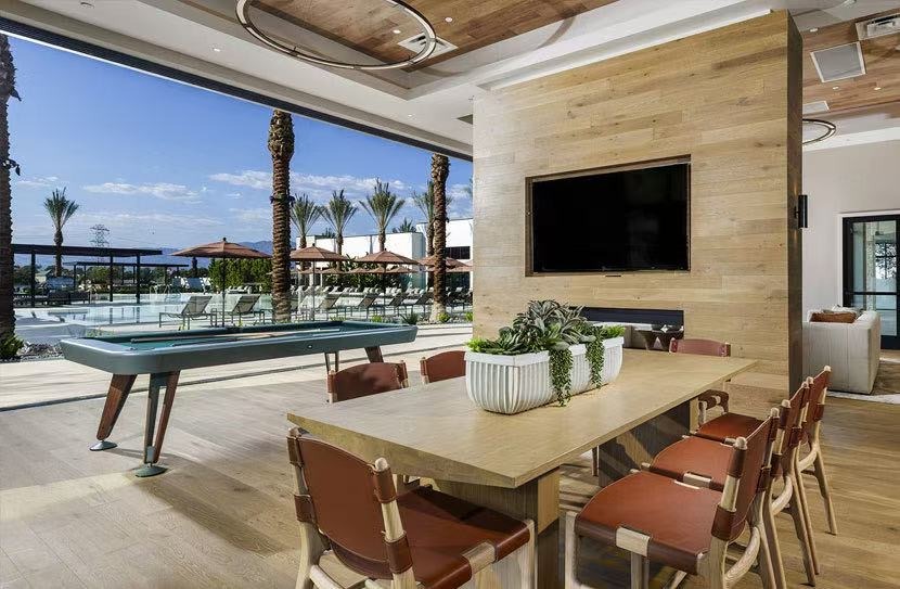Indoor recreation area with pool table and lounge seating